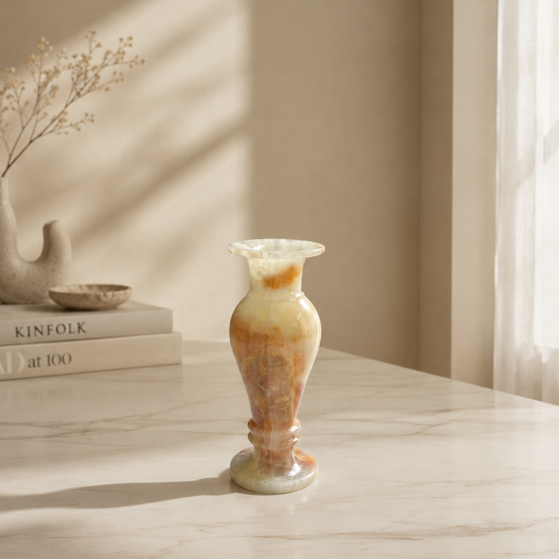 Handcrafted Onyx Marble Flower Vase on a marble tabletop with soft natural lighting