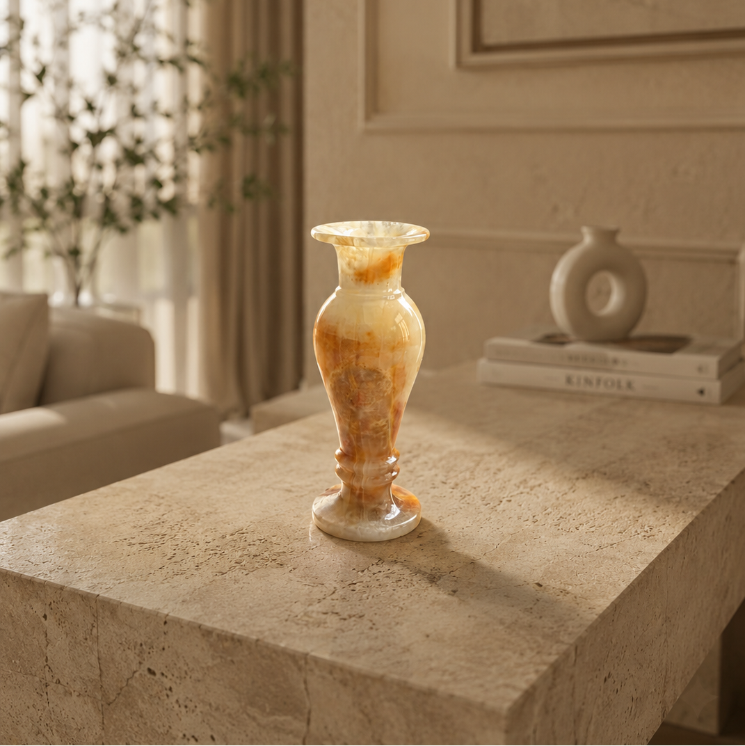 Handcrafted Onyx Marble Flower Vase styled on a stone pedestal with natural sunlight