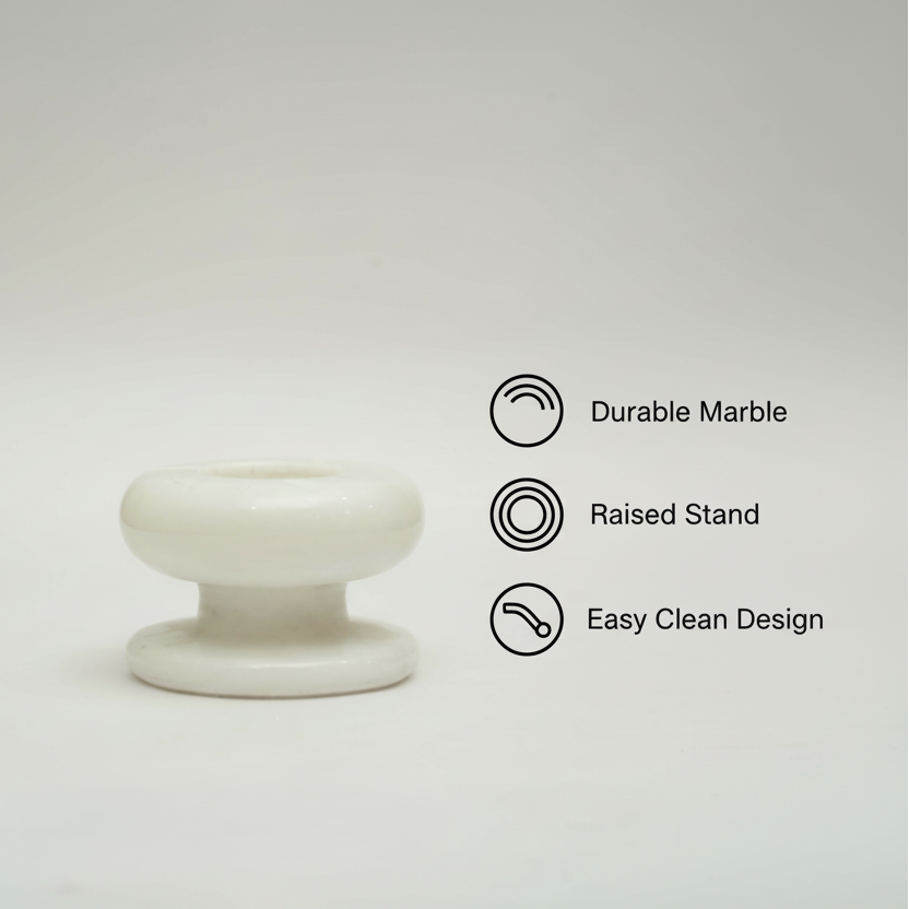 White marble pedestal ashtray with feature icons highlighting durable marble and raised stand design