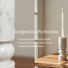 Handcrafted Banswara marble candle holder with lit candle displayed on a wooden table