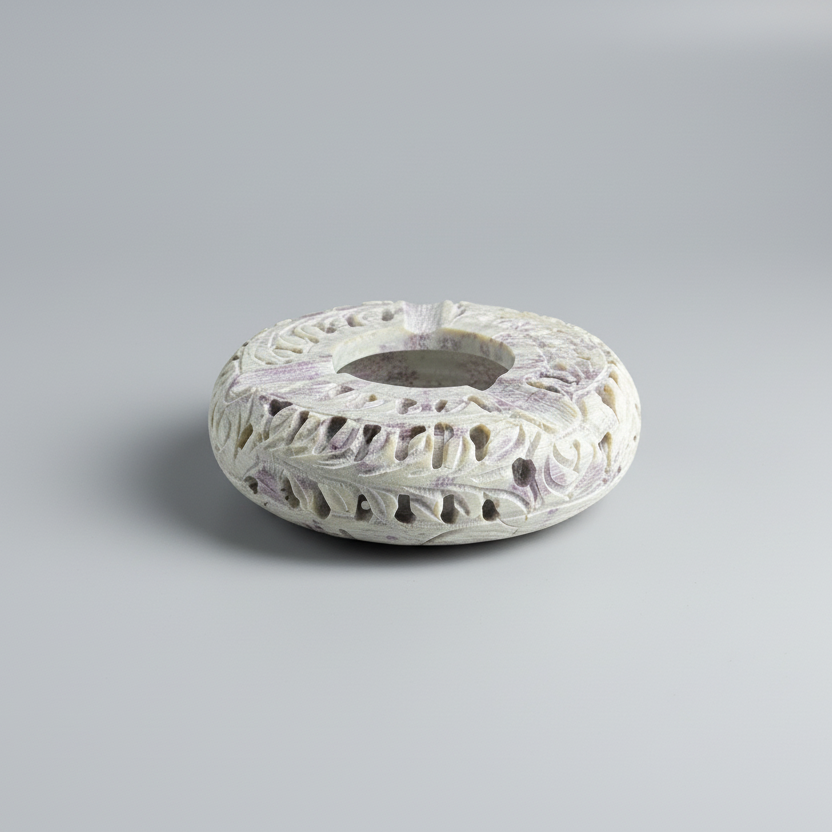 Premium Soapstone Ash Tray with intricate patterns on a gray background